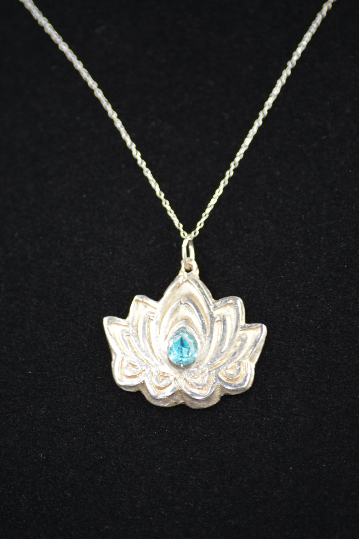 Handcrafted Sterling Silver Lotus Flower with a Centered Blue Gem Enhancement