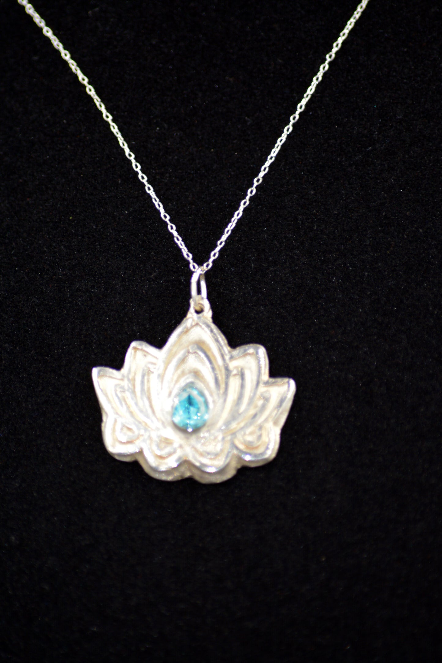 Handcrafted Sterling Silver Lotus Flower with a Centered Blue Gem Enhancement